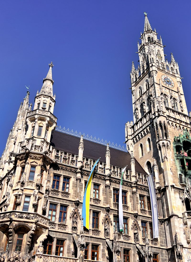 The New Rathaus in Munich’s Marienplatz showcasing its detailed Gothic Revival architecture and tall clock tower against a clear sky, a highlight for anyone exploring 3 days in Munich.
