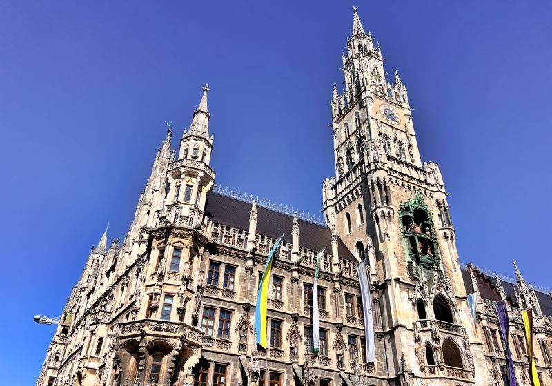 The New Rathaus in Munich’s Marienplatz showcasing its detailed Gothic Revival architecture and tall clock tower against a clear sky, a highlight for anyone exploring 3 days in Munich.