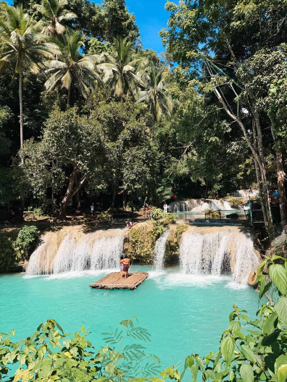Beautiful jungle waterfall and turquoise pool for relaxation.