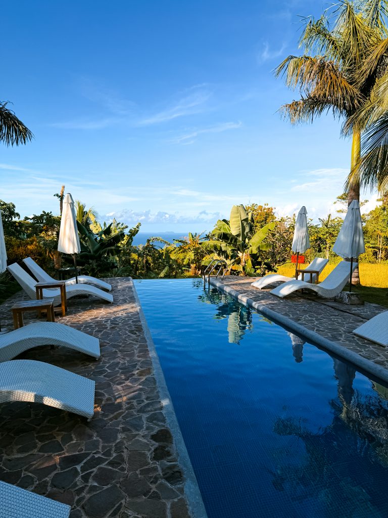 Infinity pool of South Mountain Resort in San Juan, Siquijor, overlooking the ocean.