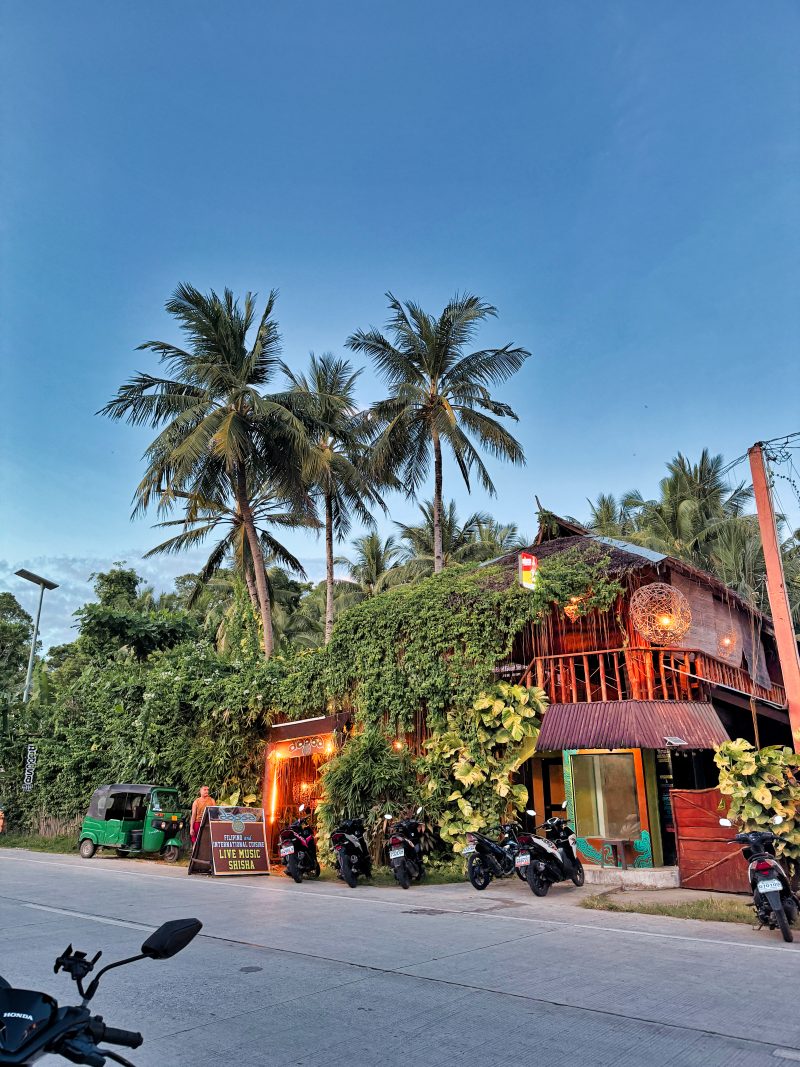 Evening hours on the streets of Siquijor in San Juan town, on the main road.