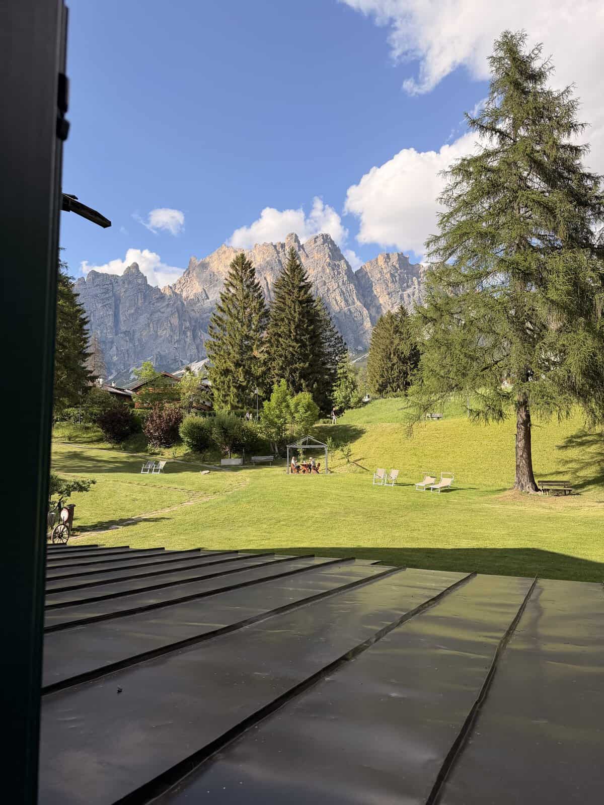 Hotel Menardi garden with Dolomites views in Cortina d’Ampezzo, a convenient place to stay before visiting Tre Cime di Lavaredo